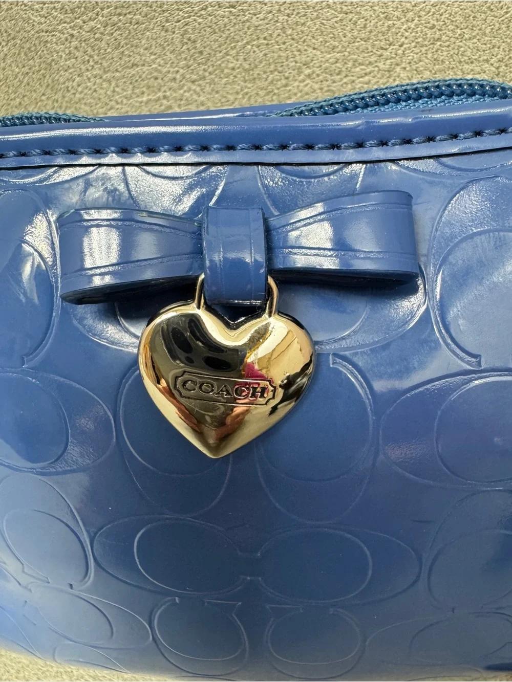 Coach Poppy blue embossed patent leather wristlet